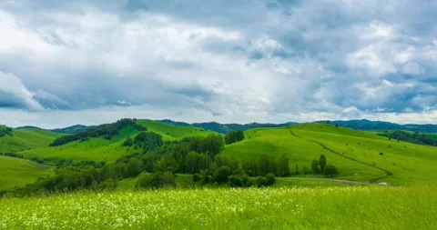 Mountain meadow time-lapse at the summer or autumn time. Wild nature and rural Stock Footage 294429360