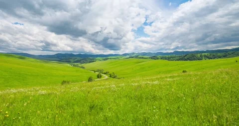 Mountain meadow time-lapse at the summer or autumn time. Wild nature and rural Stock Footage 294432270