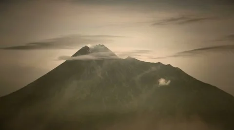 Mountain Merapi volcano, Java, Indonesia. Retro stylised video Stock Footage 64959135