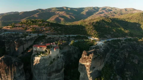 Mountain monastery n Meteora at sunset aerial view. Greece. Stock Footage 168344418