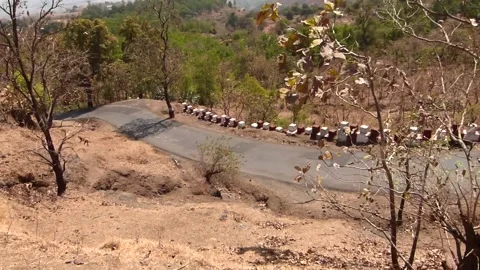 Mountain Motor road view scene Narrow Gauge Indian toy train Matheran hill India Stock Footage 138747842