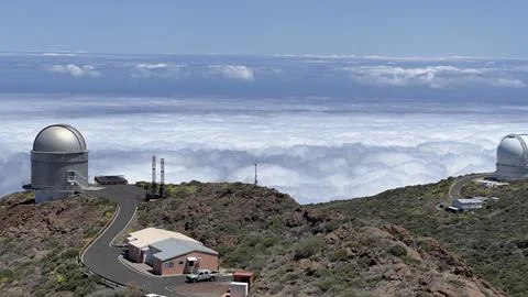 Mountain observatories above the clouds. Stock Photos