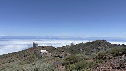 Mountain observatories above the clouds. Stock Photos