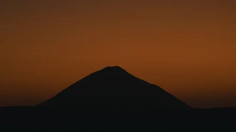 Mountain with orange sky at dusk sunset Stock Footage 261705488