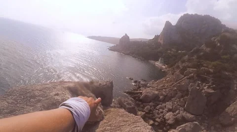 Mountain over the sea indicates the hand Stock Footage 67317160