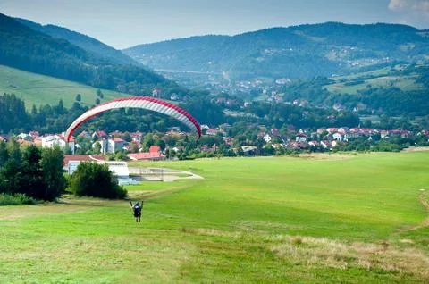 Mountain paragliding Stock Photos