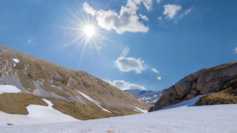 Mountain pass covered by snow at bright sunny day Stock Footage 315514933