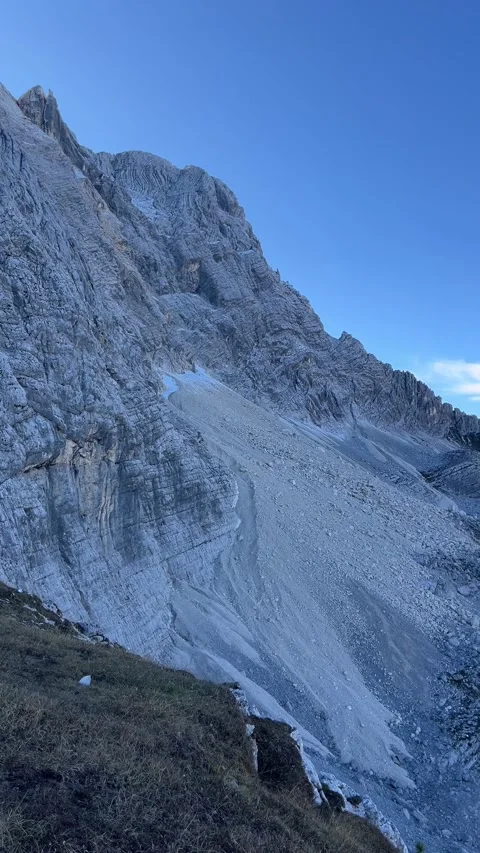 Mountain Pass in the Dolomites Under Clear Blue Sky – 4K Vertical Stock Footage 331076826