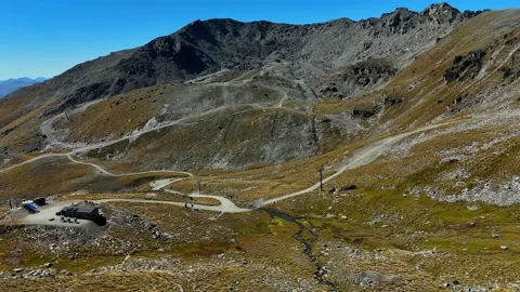 Mountain Pass Road with Switchbacks and Alpine Valley Stock Footage 341606385