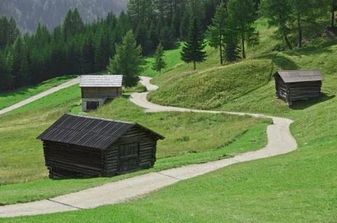 Mountain path between the huts Stock Photos