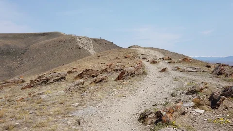 Mountain path with rocks Video stock 129790564