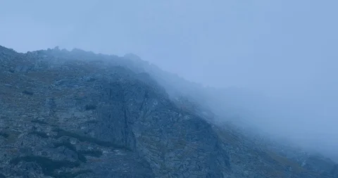 Mountain peack  in fog Stock Footage 121086876