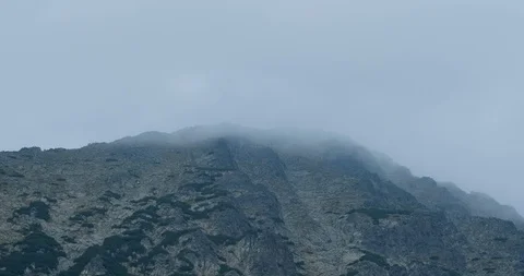 Mountain peack  in fog Stock Footage 121090994