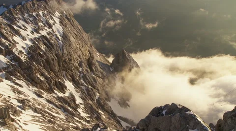 Mountain peak above clouds Stock Footage 58630845