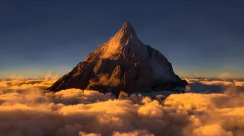 Mountain peak above the clouds Stock Illustration