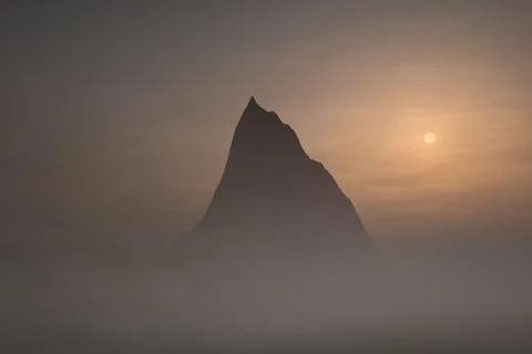 Mountain peak above the clouds Foto stock