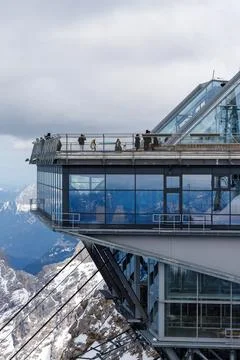 Mountain Peak Building with Viewing Platform and People Stock Photos