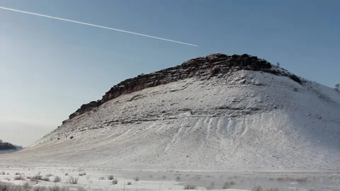 Mountain Peak Is Chipped By Winds And Rains. North. Mountain in Middle of Plain Video stock 146947425