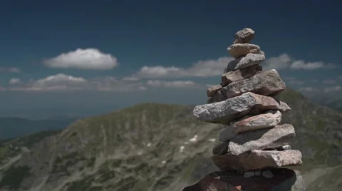 Mountain Peak Clouds and Rocks Marking the Way 4K Stock Footage 65290574