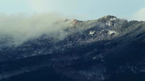 Mountain peak in a clouds Stock Footage 10796977