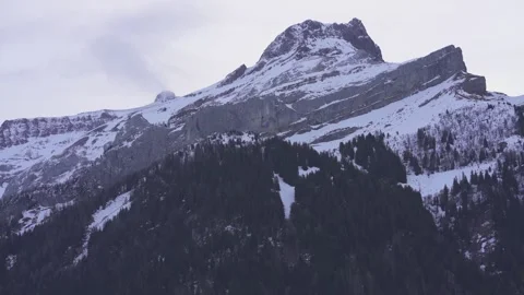 Mountain peak with clouds on summit Stock Footage 327619471