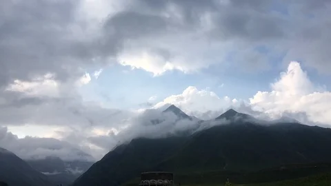 Mountain peak in clouds timelapse Stock Footage 105344112