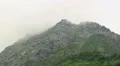 Mountain peak covered in clouds, beautiful view, time-lapse HD Footage