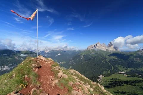 Mountain peak with flag Stock Photos