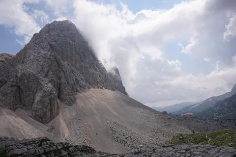 Mountain peak half covered by clouds on the Seven Lakes Valley hike Stock Photos
