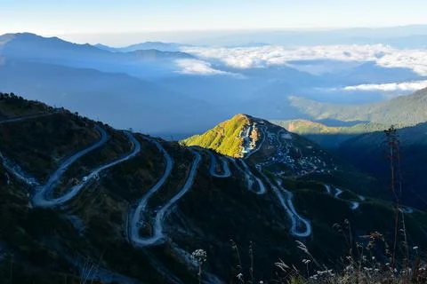 Mountain peak with ridges and cloud Stock Photos