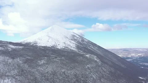 Mountain peak of Rtanj over the winter morning 4K drone video Stock Footage 105395898