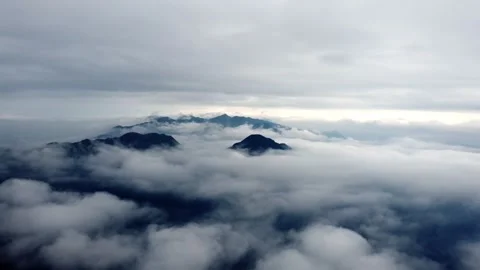 Mountain Peak Sea of Clouds Aerial Drone View with Majestic Nature Scenery Stock Footage 326736322