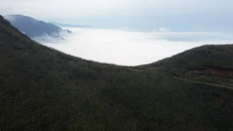 Mountain Peak Sea of Clouds Aerial Drone View with Majestic Nature Scenery Stock Footage 326736557