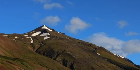 Mountain Peak With Snow and Clouds Passing By Timelapse (Iceland) 動画素材 94741775