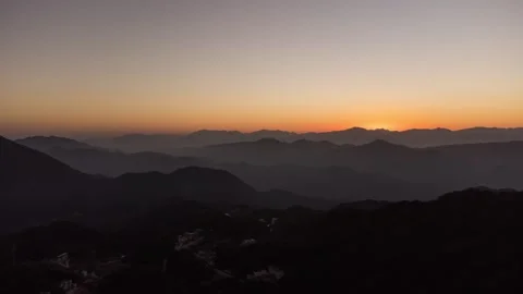 Mountain Peak Sunrise Time-lapse with Golden Dawn and Horizon Glow Stock Footage 326675640