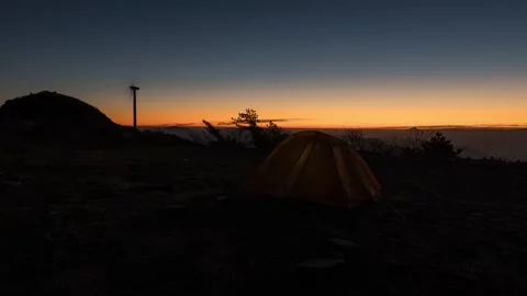 Mountain Peak Sunrise Time-lapse with Golden Dawn and Moving Clouds Stock Footage 326679412