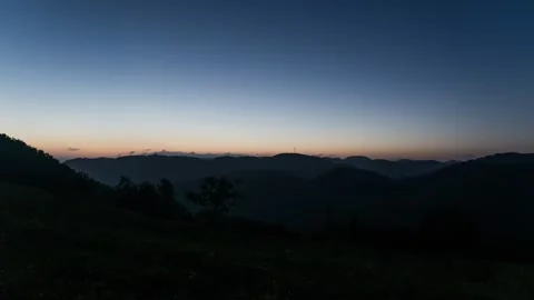 Mountain Peak Sunrise Time-lapse with Golden Morning Sun and Sea of Clouds Stock Footage 326690271