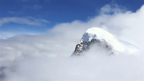 Mountain Peak in Thick Clouds Stock Footage 69784307