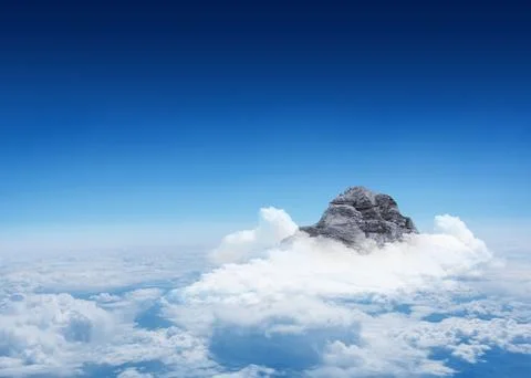 Mountain peak through the clouds Stock Illustration