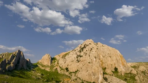 Mountain peak under a cloudy sky Stock Footage 120254563