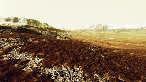 A mountain peak with a unique brown patch of grass at the summit Stock Illustration