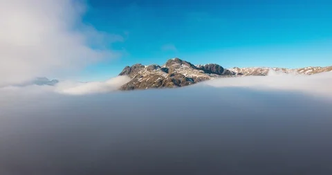 Mountain peaks above the clouds Stock Footage 122656268