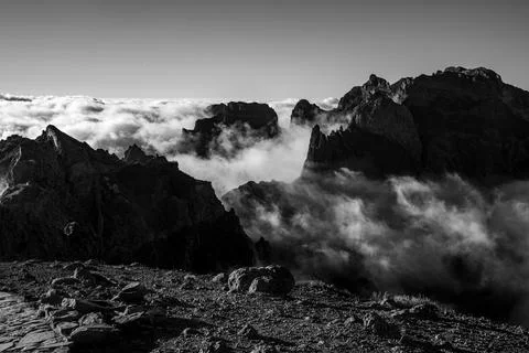Mountain peaks among the clouds. Stock Photos