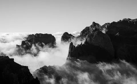 Mountain peaks among the clouds. Stock Photos