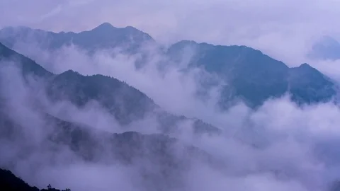 Mountain peaks and clouds 6 Stock Footage 83999786