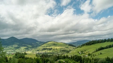 Mountain peaks and cloudy sky. Timelapse. Stock Footage 77551506