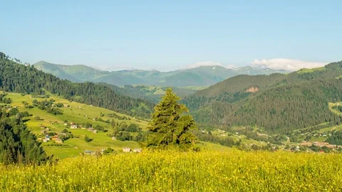 Mountain peaks and cloudy sky. Timelapse. Stock Footage