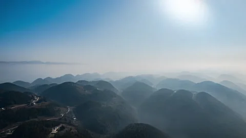 Mountain Peaks and Sea of Clouds Scenic Timelapse Stock Footage 320769989