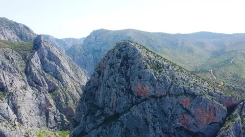 Mountain Peaks on a Canyon Stock Footage 247954778