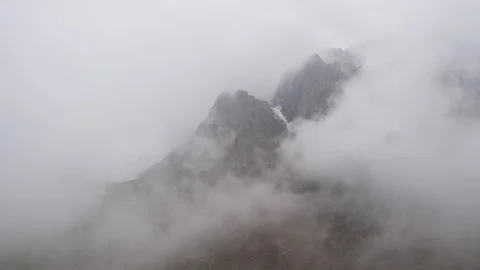 Mountain peaks in the clouds Stock Footage 129070148